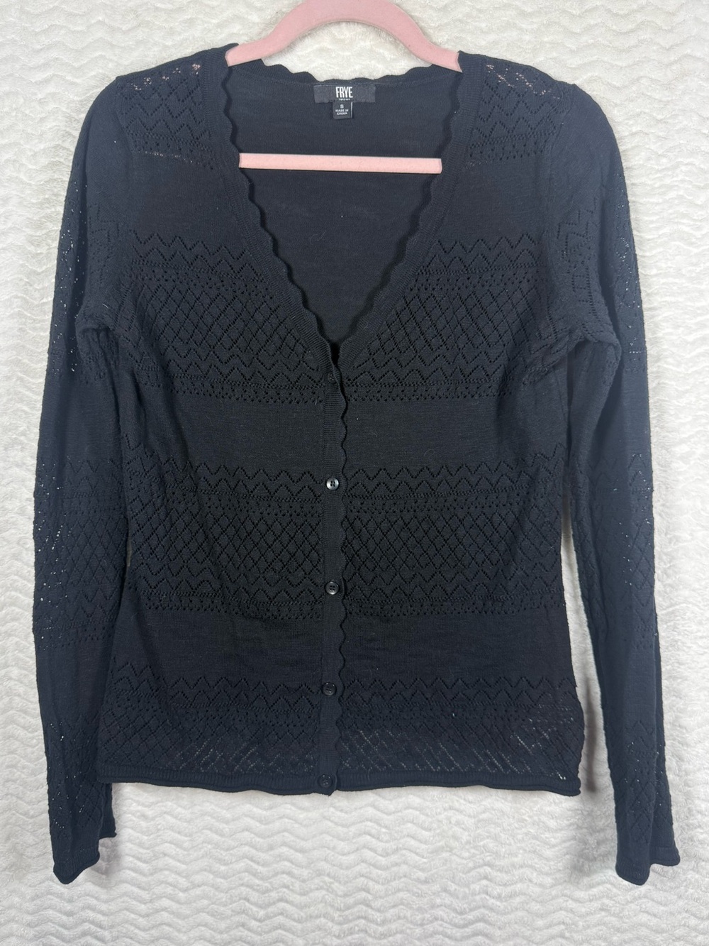 Frye pointelle black cardigan with scalloped V-neckline and button closure